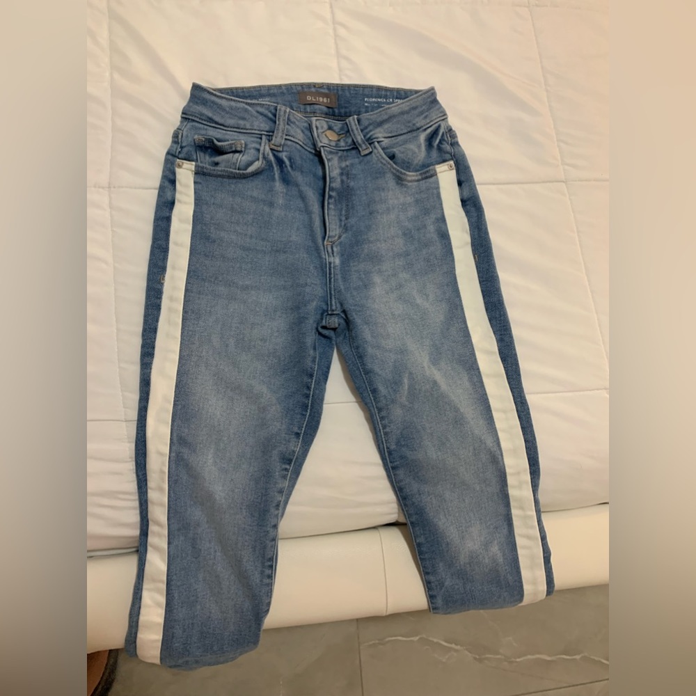 DL1961 jeans with white stipe going down the side